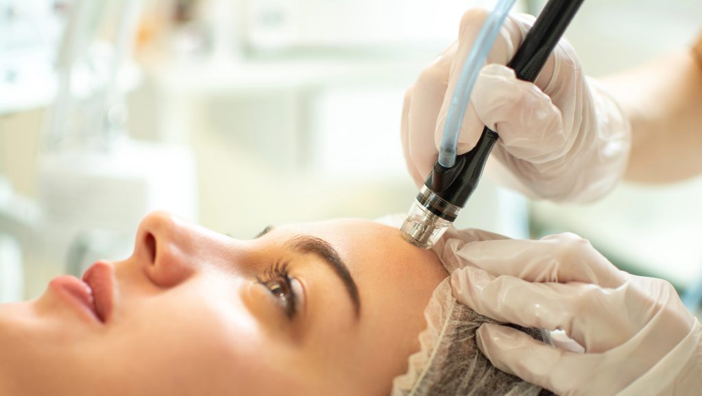 woman having her facial treatment session